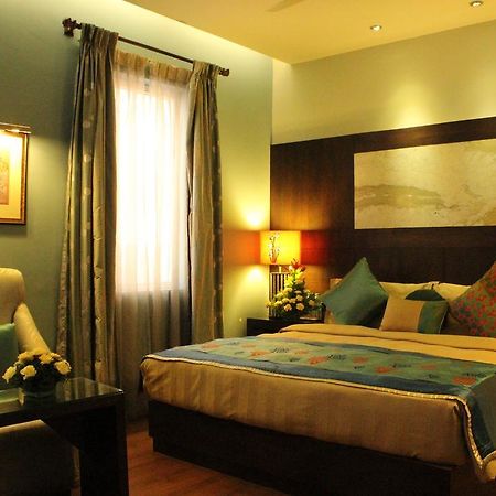 Justa Mg Road Hotell Bangalore Eksteriør bilde