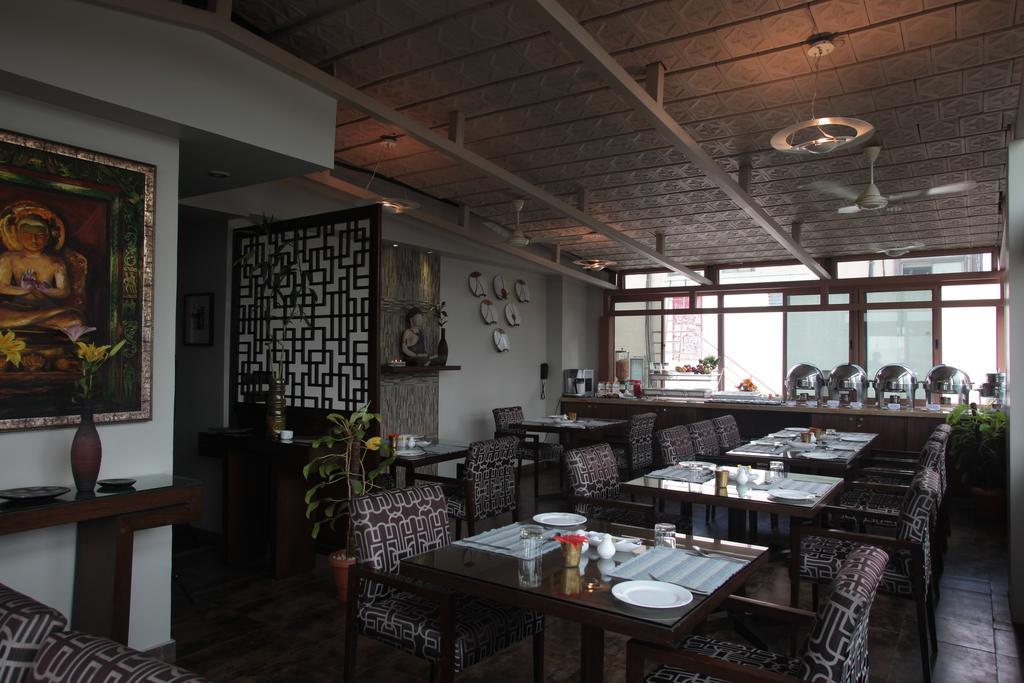 Justa Mg Road Hotell Bangalore Eksteriør bilde
