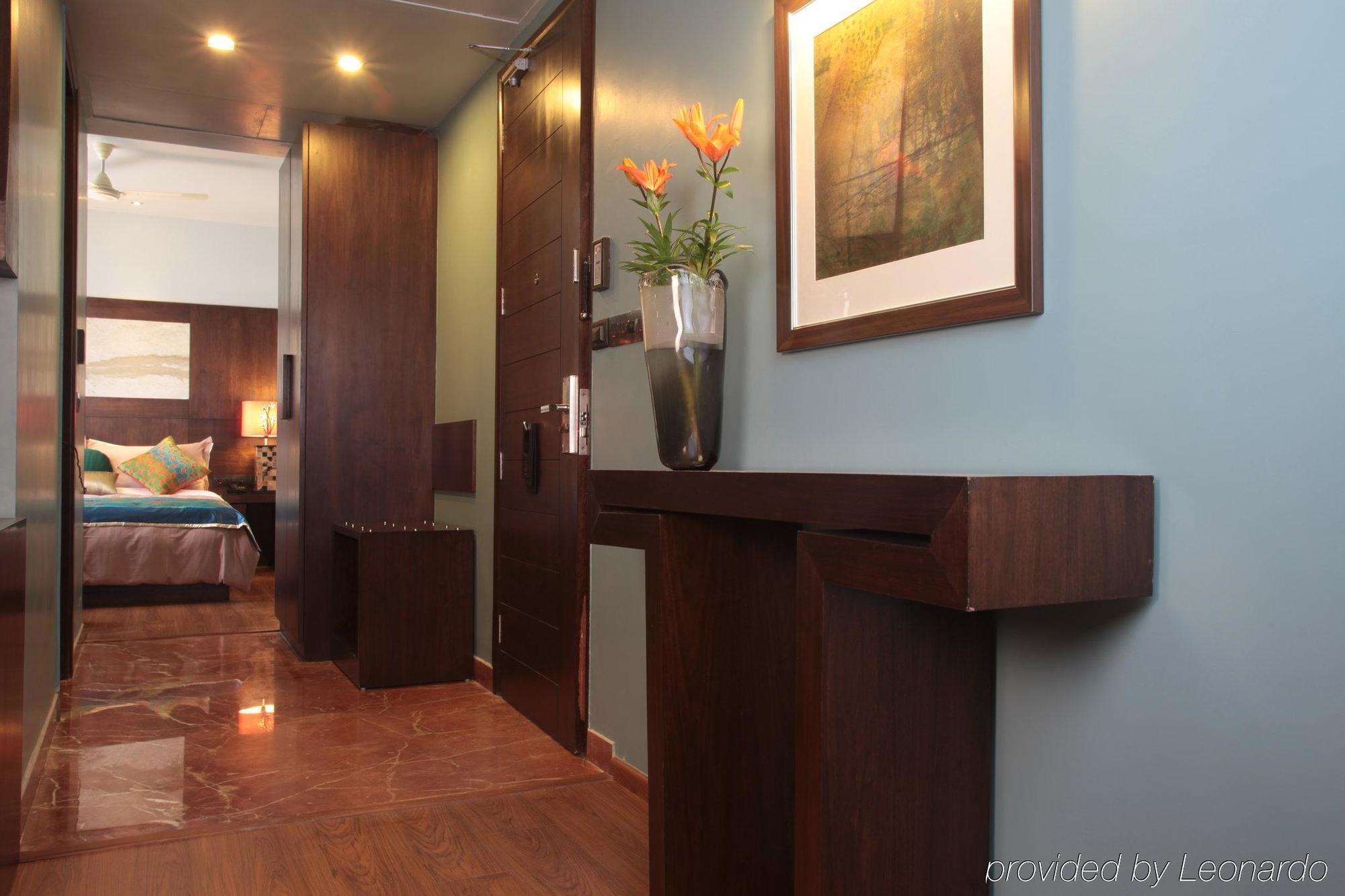 Justa Mg Road Hotell Bangalore Rom bilde